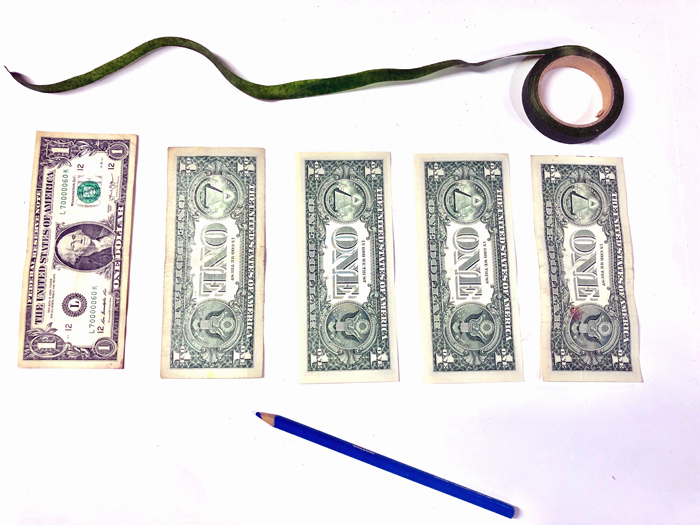 dollar bills arranged in order to make paper money flowers