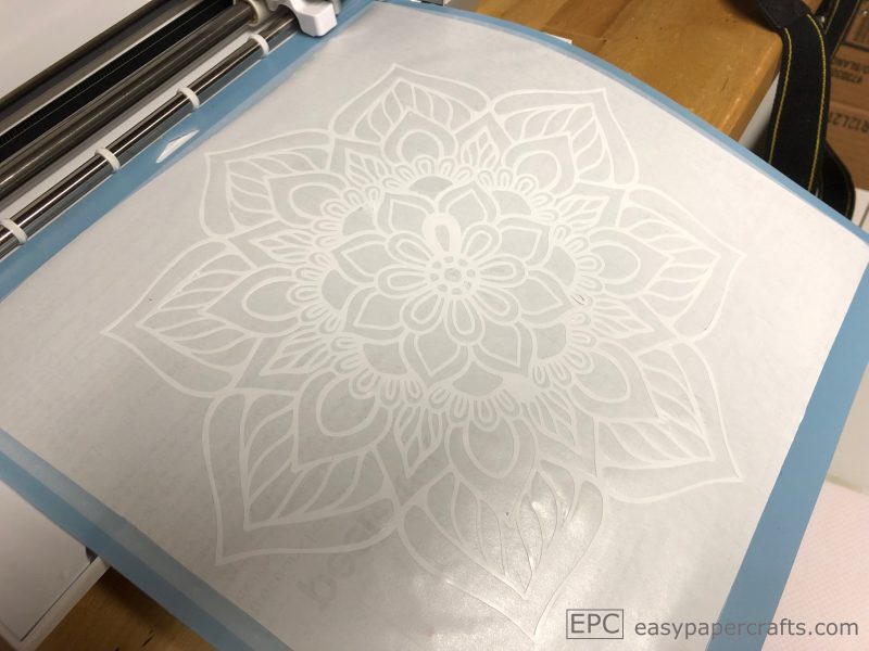 DIY Boho Mandala Serving Tray sticker on a cricut mat