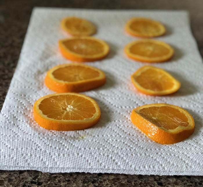 orange slices on a paper towel