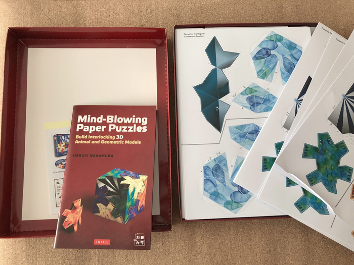 Inside of Mind-Blowing Paper Puzzles Kit: Build Interlocking 3D Animal and Geometric Models craft kit box (3d Paper Crafts)