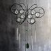 butterfly windchime against chalk board